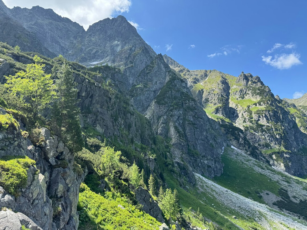 Rocky mountain range under blue sky